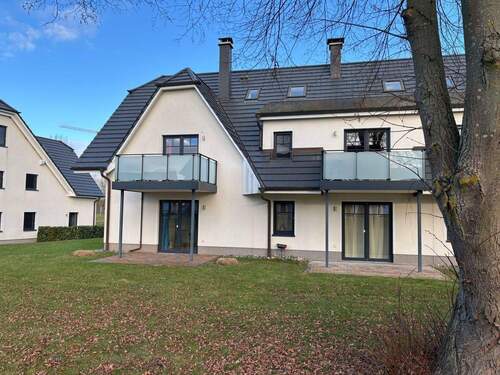 Rückansicht Ferienhaus - 3 Zimmer Etagenwohnung zum Kaufen in Mönchgut