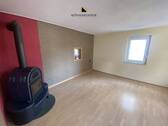 Wohnzimmer 1. OG mit Kaminofen - 