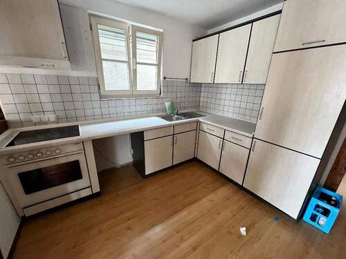 Küchenbereich mit Einbauküche - 