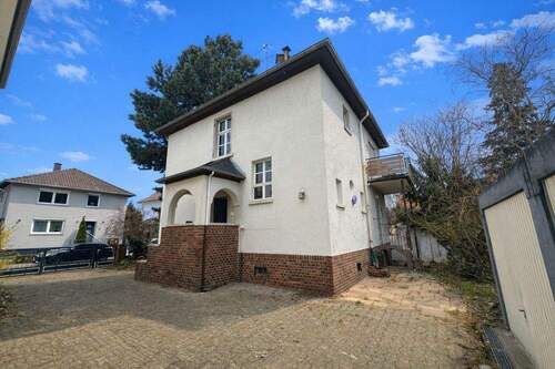 Seitenansicht - 6 Zimmer Einfamilienhaus zum Kaufen in Viernheim