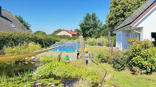 Ruhepol Gartenteich - 4 Zimmer Einfamilienhaus zum Kaufen in Bröbberow