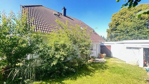 rückwärtige Gebäudeansicht - 4 Zimmer Einfamilienhaus in Bröbberow