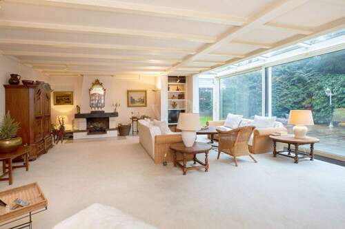 Wohn-/Esszimmer mit Kamin u. Terrassenzugang (I) - 