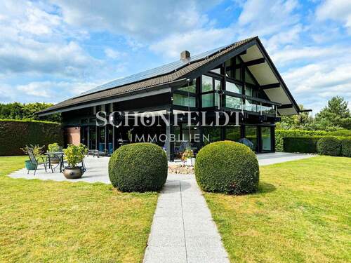 Aussenansicht 1 - Design trifft Natur - stilvolles Wohnen im HUF HAUS auf parkähnlichem Grundstück