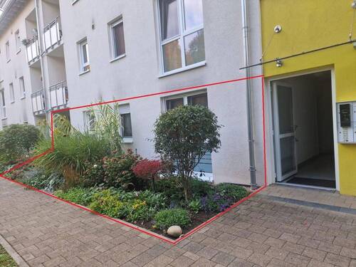 Bild 1 - 5 Zimmer EG Wohnung mit Terrasse,Garten und TG.