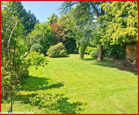 Gartenansicht im Sommer - Einfamilienhaus mit 140,80 m² in Jagel zum Kaufen