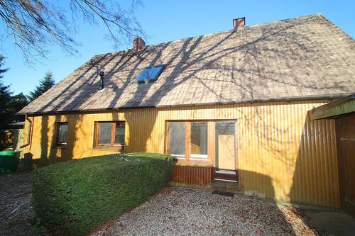 Die Rückseite von dem Einfamilienhaus - Einfamilienhaus mit 136,00 m&sup2; in Harmsdorf zum Kaufen