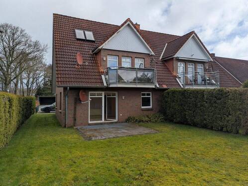 Gartenansicht (1) - kompakte Erdgeschosswohnung in Augustfehn