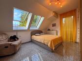 Charmantes Dachzimmer mit Wohlfühlatmosphäre - 