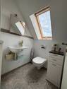 Helles Bad unterm Dach - 