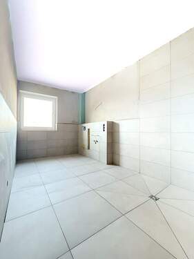 Badezimmer mit bodengleicher Dusche - 