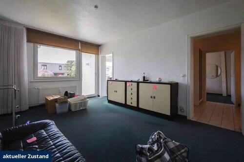 Wohnzimmer aktueller Zustand - Etagenwohnung mit 74,00 m&sup2; in Monheim am Rhein / Baumberg zum Kaufen