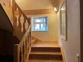 Treppenhaus vom Erdgeschoss in das Obergeschoss - 