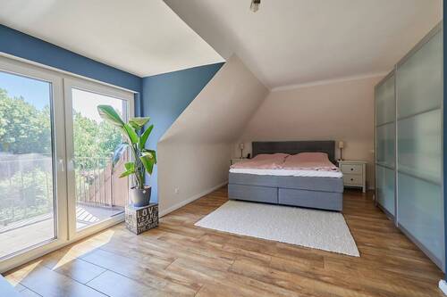 Schlafzimmer mit Balkon - 