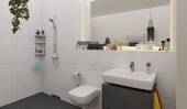 Ein modern gefliestes Badezimmer - Etagenwohnung mit 61,30 m&sup2; in Hasloh zum Kaufen