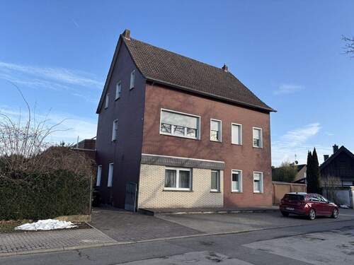 Straßenansicht - Voll vermietetes 4-Familienhaus in zentrumsnaher Lage in Neubeckum!