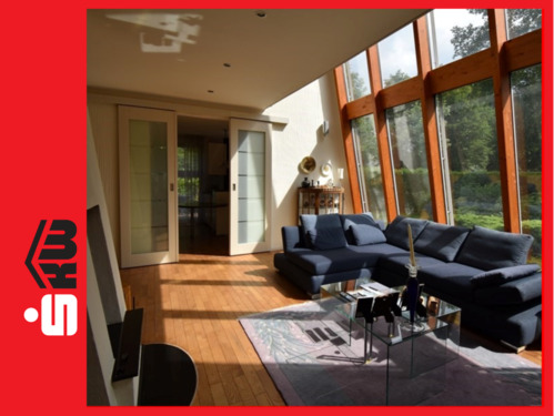 lichtdurchflutetes Wohnzimmer - Besondere Immobilie mit rundem Gründach * 2669 GV Einfamilienhaus in Versmold