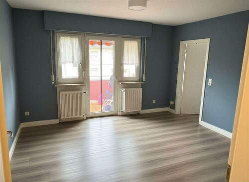 Wohnzimmer - (KI generiert) - 3 Zimmer Etagenwohnung zum Kaufen in Rüsselsheim am Main