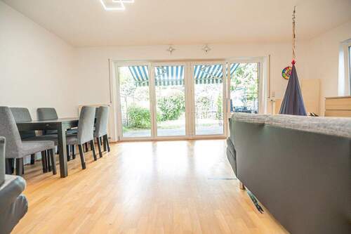 Wohnzimmer - Reihenendhaus mit 103,20 m&sup2; in Edewecht zum Kaufen