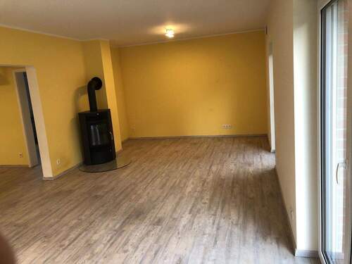 Wohnzimmer mit Kaminofen - 