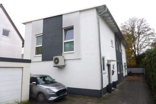 1. Seitenansicht - Moderne Doppelhaushälfte mit 4 Zimmern