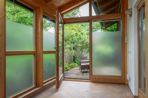 Wintergarten mit Zugang zur Terrasse - 