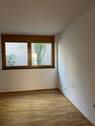 Helles Zimmer mit Holzboden - 