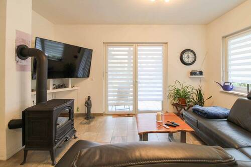 Wohnbereich mit Kamin - Einfamilienhaus mit 129,20 m&sup2; in Blankenfelde-Mahlow zum Kaufen