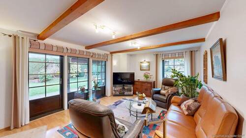 Wohnzimmer mit Zugang zur überdachten Terrasse - Provisionsfrei für Käufer: Top Wohnlage - Einfamilienhaus mit Garten und Carport in Hamm-Rhynern