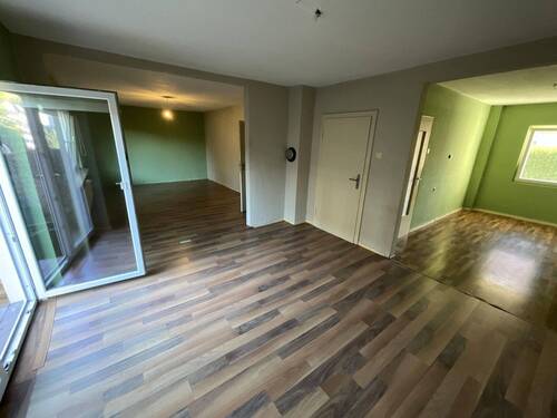 Wohnzimmer mit offenem Arbeitszimmer - 