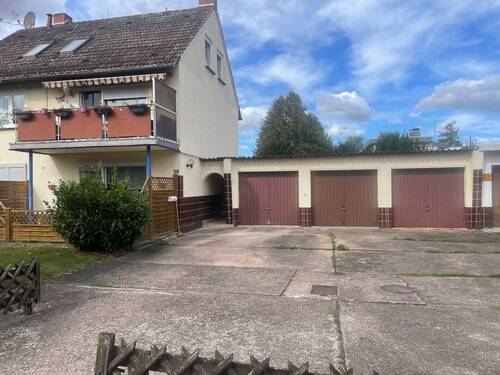 Garage - Etagenwohnung mit 66,00 m&sup2; in Niestetal zum Kaufen