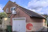 Garage vor dem Haus - 3 Zimmer Mehrfamilienhaus, Wohnhaus in Rodalben