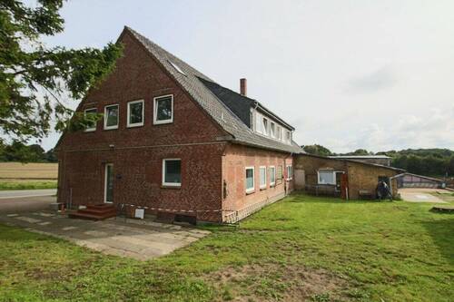 Seitenansicht - 1 Zimmer Mehrfamilienhaus, Wohnhaus in Wagersrott
