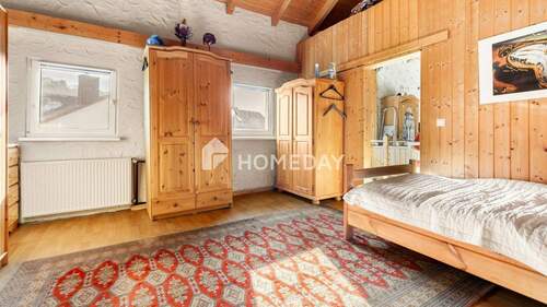 1. OG Schlafzimmer 2 - 