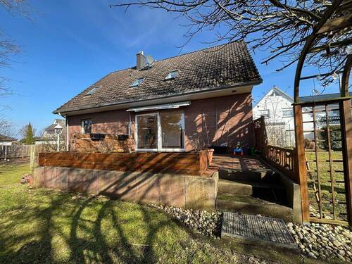 Seitenansicht - Einfamilienhaus mit 150,00 m&sup2; in Weyhe zum Kaufen