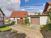 Ansicht Haus mit Garage - Einfamilienhaus mit 76,00 m&sup2; in Weimar zum Kaufen