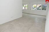 Wohn- und Essbereich Bild III - Etagenwohnung mit 87,00 m&sup2; in Esens zum Kaufen
