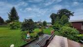 Blick in Garten - Einfamilienhaus mit 180,00 m² in Lengenfeld zum Kaufen