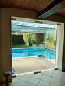 Übergang vom Partyraum zum Poolhaus - 