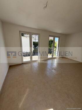 Wohnzimmer zur Terrasse - Einfamilienhaus mit 134,30 m&sup2; in Mülheim an der Ruhr / Styrum zum Kaufen