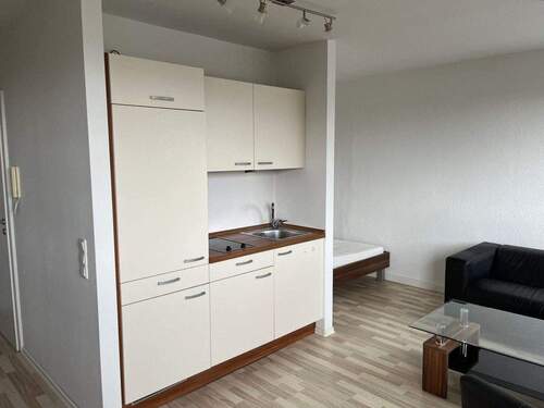 Küchenzeile - Möbliertes 1 Zimmer-Appartement mit modernem Duschbad, 2. OG mit Aufzug, Außenstellplatz oder TG-Stellplatz optional
