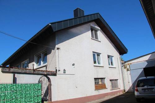Bild 1 - Großzügiges Haus mit Einliegerwohnung, Grundstück und Abstellhalle