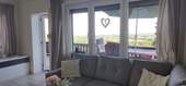 Wohnzimmer mit Balkon - 