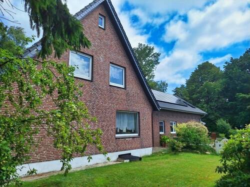 Seitenansicht mit Anbau - Einfamilienhaus mit 284,00 m² in Havetoft zum Kaufen