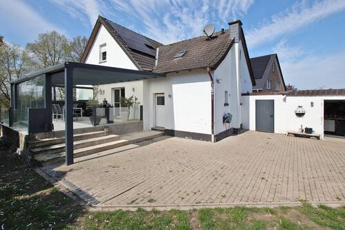 Ansicht Garten - Einfamilienhaus mit 130,70 m&sup2; in Hörstel zum Kaufen