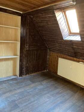 Zimmer im Dachgeschoss - 