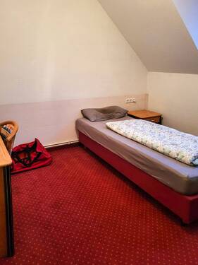 Schlafzimmer - Mehrfamilienhaus, Wohnhaus mit 665,00 m² in Hillerse / Volkse zum Kaufen