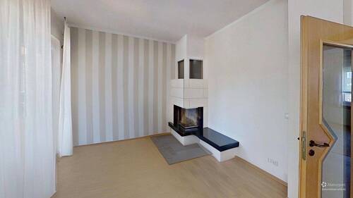 Wohnzimmer mit Kaminanlage - Einfamilienhaus mit 233,00 m² in Stendal zum Kaufen