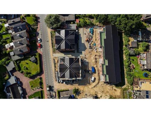 Vogelperspektive - Mehrfamilienhaus, Wohnhaus in Boostedt zum Kaufen