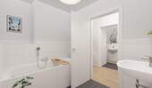 Modern gefliestes Badezimmer inklusive Badewanne - 
